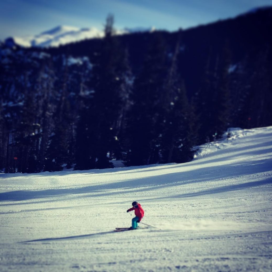Lee skiing down Blackcomb side